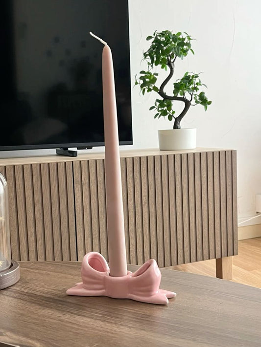 Pillar candle with bow holder